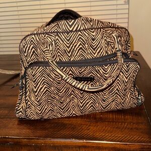 Vera Bradley - Weekender Bag
- Animal Print - Signature
Quilt Textile